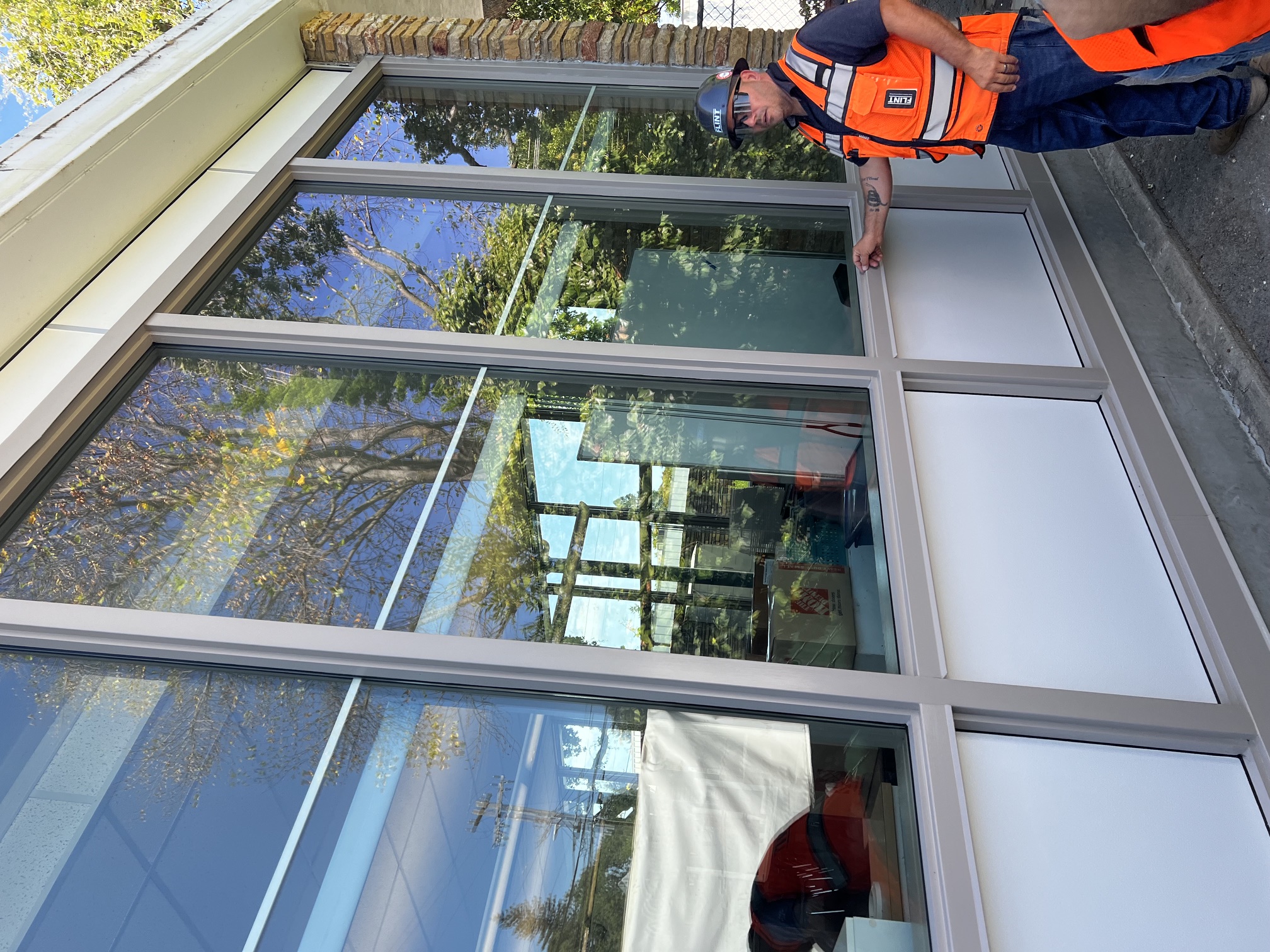 New windows at Brittan Acres — contractor showing the upgraded building envelope