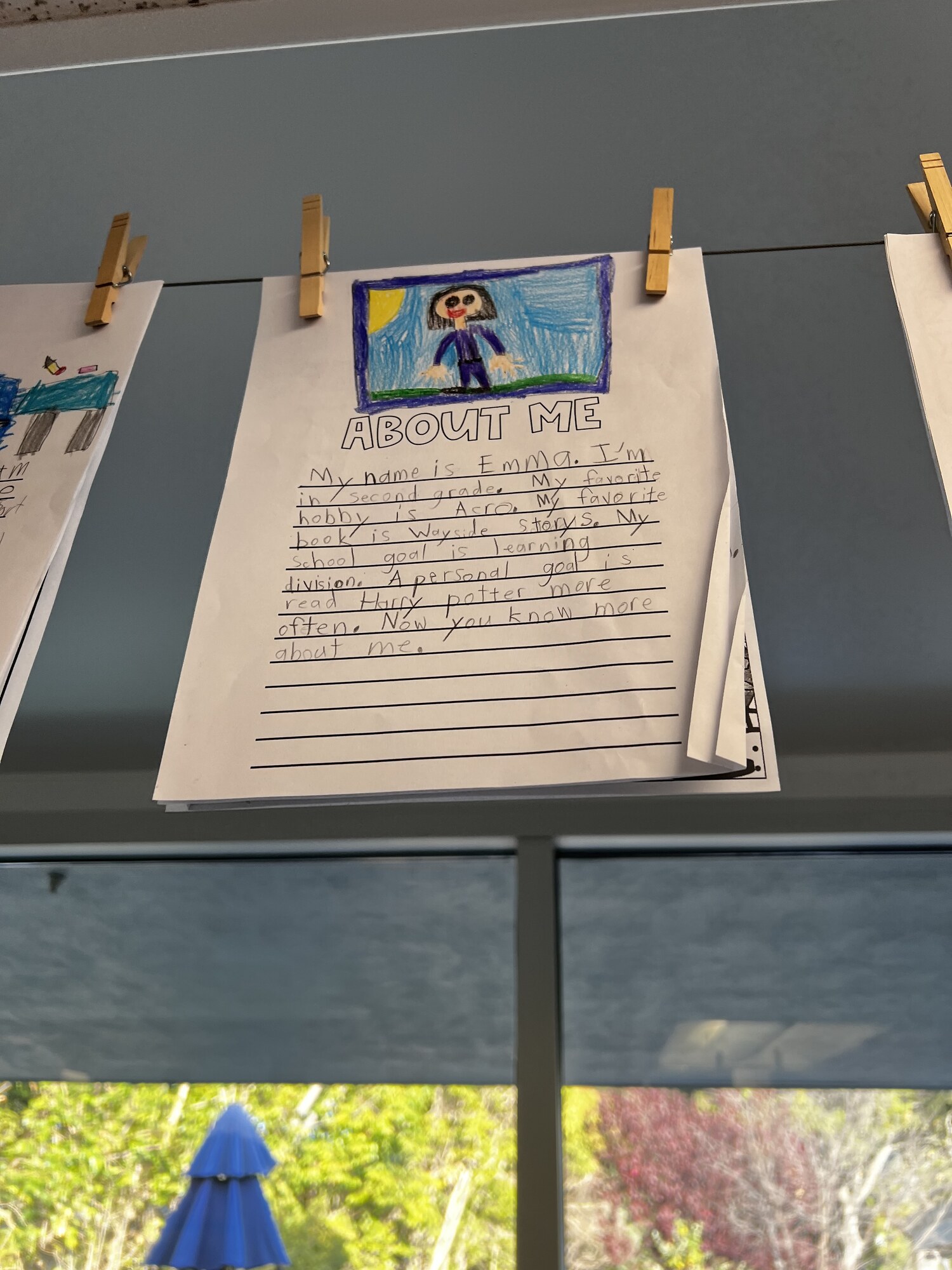 Student About Me work displayed in a classroom