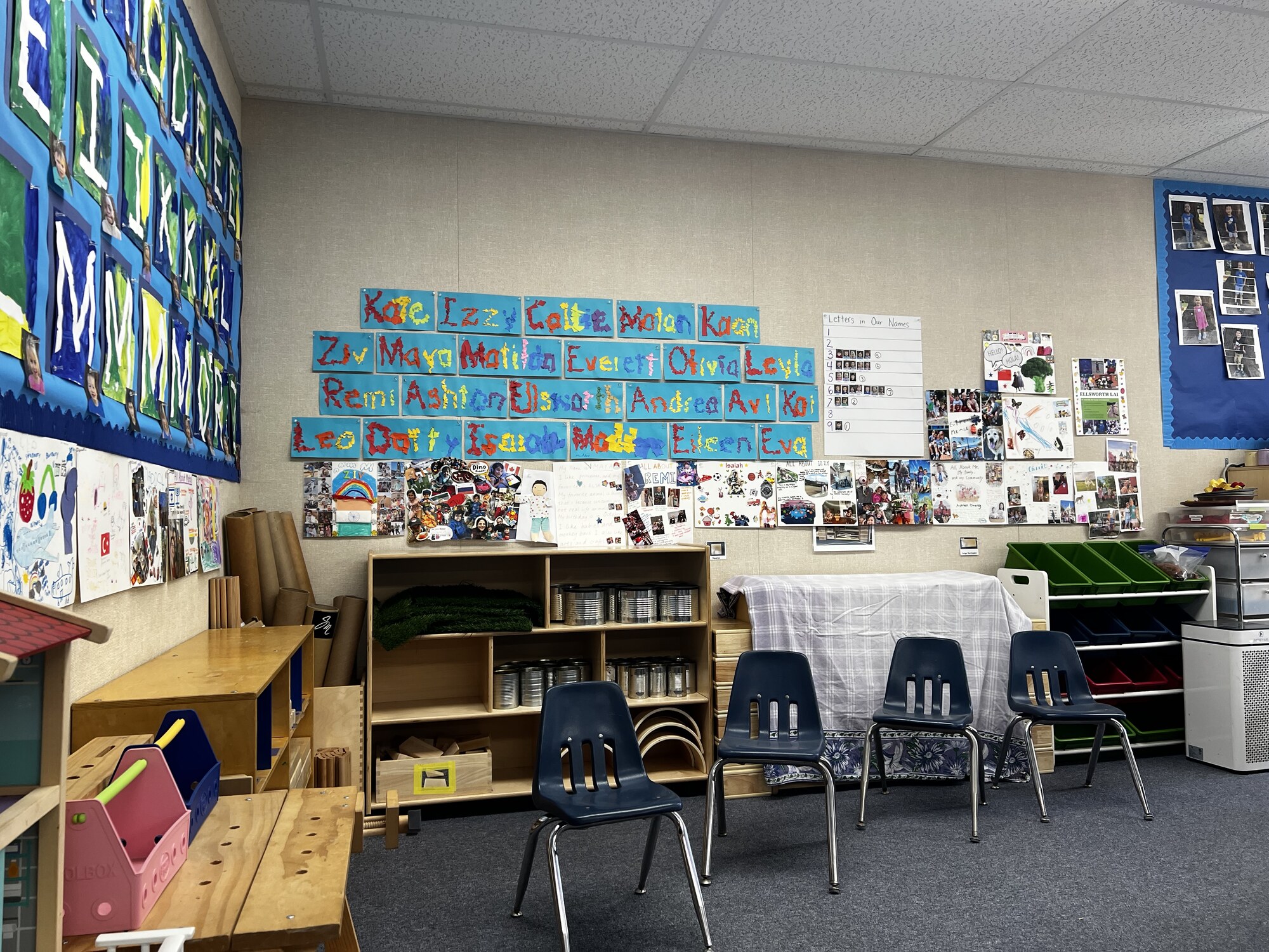A classroom prepared for Back to School Night with student artwork displayed on the walls